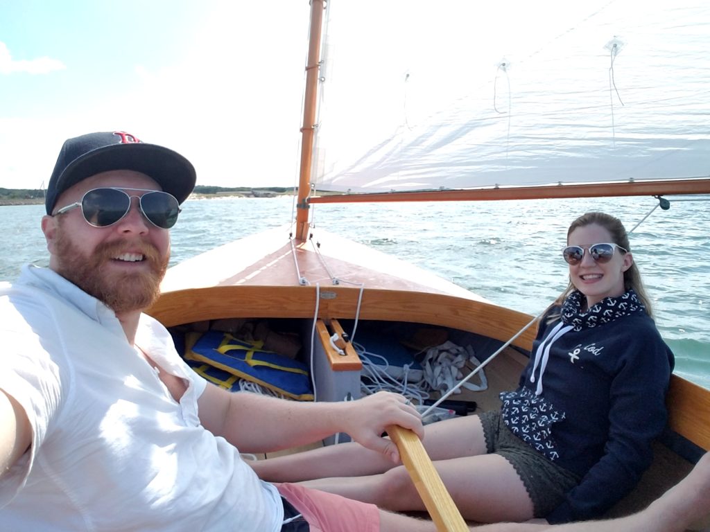 Couple taking a selfie while sailing